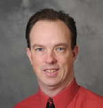 Image of Dr. Christopher J. Whitty, MD, PHD