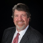 Image of Dr. Guy M. Lewis, DDS